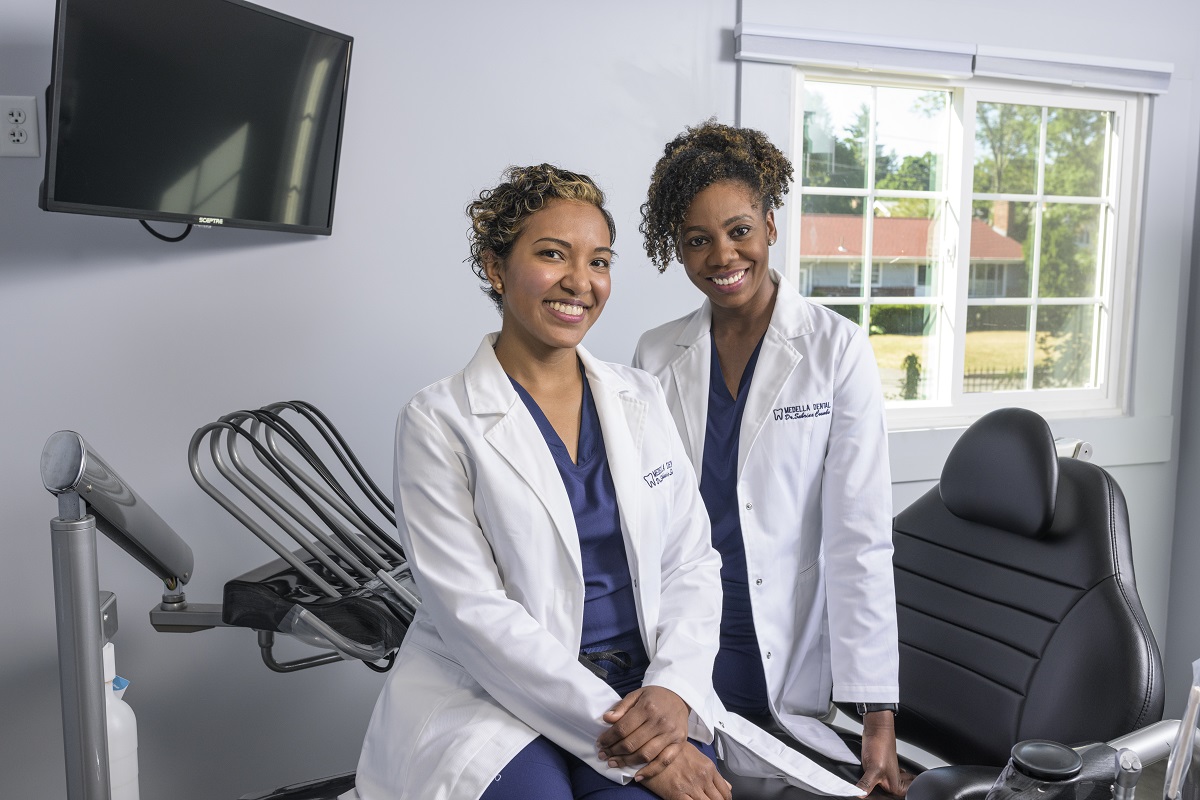 Dr. Sabrina Coombs and Dr. Stephanie Sadler of Medella Dental smile at the camera