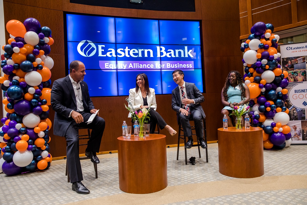 Quincy Miller sits with fireside chat speakers Carmen Panacopoulo, Stephan Chan, and Shakenna Williams 