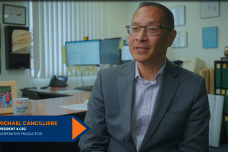 Michael Cancilliere, president and CEO of Cooperative Production, sits in his office and speaks about working with Eastern Bank