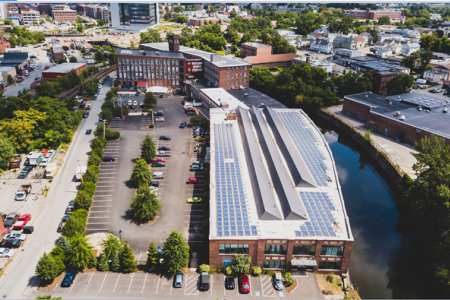 Aerial view of Western Avenue Studios & Lofts brick building